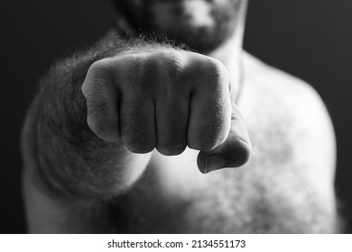 Arm Extended With Hand Closed Fist. Isolated To Black Sfodno