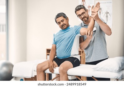 Arm pain, physiotherapy and man with patient stretching for wellness, medical service and consulting. Healthcare, chiropractor and physical therapist with person for rehabilitation, recovery and help - Powered by Shutterstock