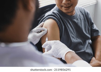 The Arm Of The Patient Who Is Being Injected With Vaccine Or Antibodies In His Arm