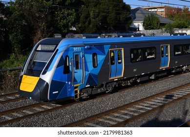 Armadale, Victoria, Australia - April 23 2022: Side View Of A New HCMT's Front Carriage, With Blue And Yellow Metro Livery, As The Train Transports Passengers Through Melbourne's Inner Suburbs