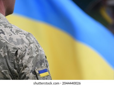 Armed Forces of Ukraine. Ukrainian soldier. Ukrainian in army. Ukrainian flag on military uniform.  - Powered by Shutterstock