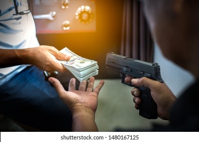Armed robbers used the gun to robbery the money, Uses Gun in Armed Robbery, Armed robbers, 