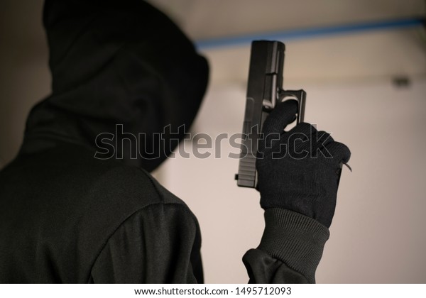 Armed\
robbers used the gun to robbery the money, Uses Gun in Armed\
Robbery, Armed robbers, used for the illustration or montage of\
your design, Banner for advertise of\
product