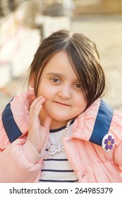 Armenian Girl In A Jacket With A Badge On The 100th Anniversary Of The Genocide In 1915