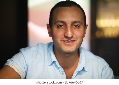 Armenian Handsome Man Portrait Smoking Hookah In Cafe
