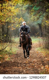 Armored Medieval Warrior Riding A Horse