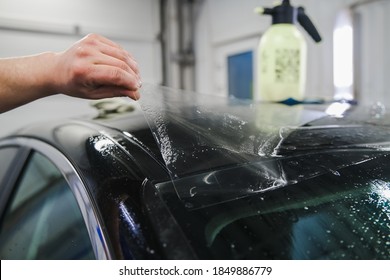 armoring with film of car body parts at a shallow depth of field