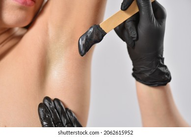 Armpit Waxing Depilation For A Young Woman, Stock Photo.