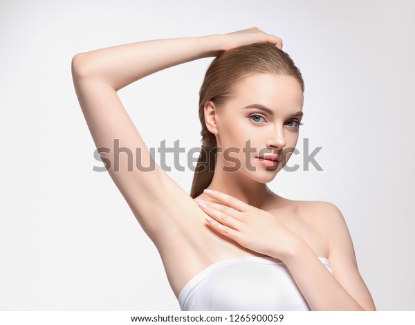 Armpit\
woman hand up deodorant care depilation\
concept