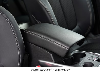 Armrest in the luxury passenger car between the front seats - Shutterstock ID 1888795399
