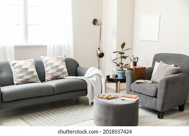 Armrest table on armchair in interior of room - Shutterstock ID 2018557424