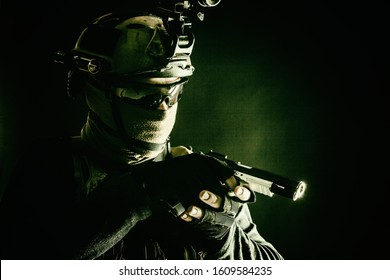 Army Counter-terrorism Squad, Police SWAT Team Fighter Hiding Identity Behind Mask And Glasses, Wearing Helmet With Night Vision-device, Creeping In Darkness, Aiming Service Pistol During Mission