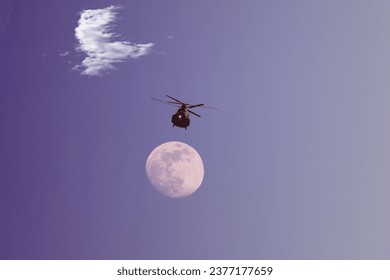 Army helicopter and moon background 