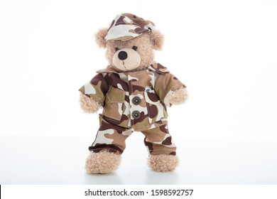 Army, Military Concept. Cute Teddy Bear In Soldier Uniform Standing Isolated Against White Background