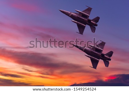 Army Show performant of air craft in air show with twilight sky background.
