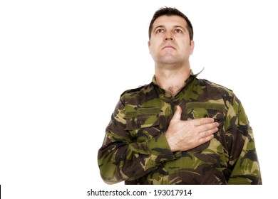 army soldier swear solemnly with hand on heart isolated on white background