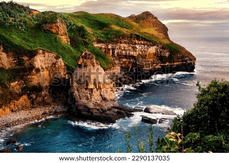 Arnadal cliffs in summer time. Isla. Santander. Spain.