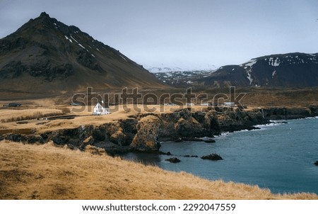 Arnarstapi is a picturesque coastal village located on the Snæfellsnes Peninsula in Iceland. The rugged cliffs and dramatic rock formations, such as the famous Gatklettur arch, make for stunning photo