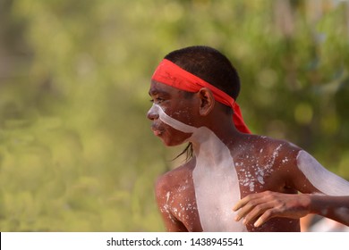 ARNHEM LAND, NT - JUNE 08 2019:Young Adult Indigenous Australians Aboriginal Man Dancing A Cultural Ceremony Dance.