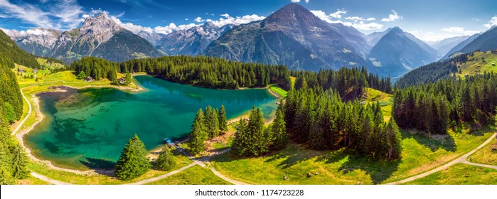 Arnisee with Swiss Alps. Arnisee is a reservoir in the Canton of Uri, Switzerland, Europe. 