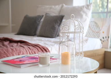 Aroma Candles On Table In Bedroom