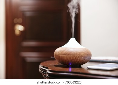 Aroma Oil Diffuser On Table Im Room