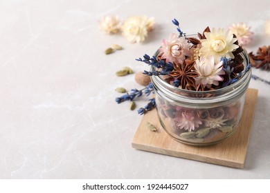 Aroma potpourri with different spices on white table, space for text