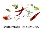 Aroma spice card: dried red hot chilli peppers, cloves garlic, mix peppercorn, bay leaves, rosemary and parsley fresh herb. Aromatic spicy ingredients for cuisine isolated on white background