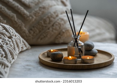 Aromatherapy, atmosphere of relax, serenity and pleasure. Concept of spa treatment in salon. Natural organic essential oil, towel, burning candles. Anti-stress, detox procedure, wellness - Powered by Shutterstock