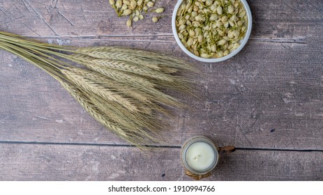 Aromatherapy Flatlay Still Life Rustic Display Of Wheat Rye Bunch, Bowl Of Seeds And Small Artisan Candle Life Style