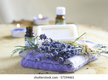 Aromatherapy oil, lavender, soap and towels
