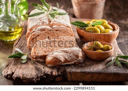 Aromatic bread with extra virgin olive oil. Loaf of bread made of with olive oil.