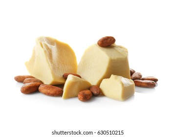 Aromatic cocoa beans and butter on white background