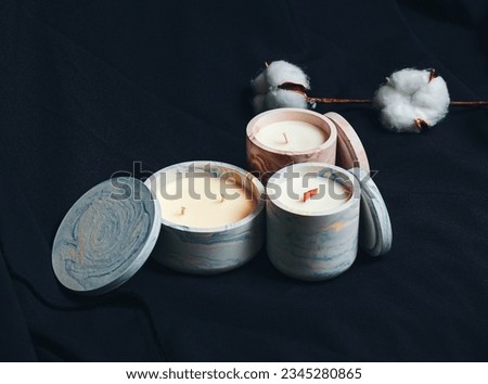 Aromatic decorative candles in plaster bowls. Handmade, making candles