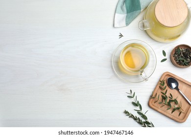Aromatic Eucalyptus Tea On White Wooden Table, Flat Lay. Space For Text