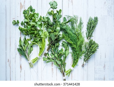 Aromatic herbs and spices from garden, healthy cooking concept, lay flat from above - Powered by Shutterstock