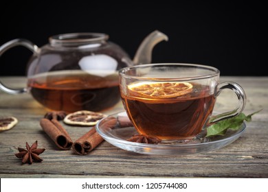 Aromatic Hot Cinnamon Tea On Wooden Table