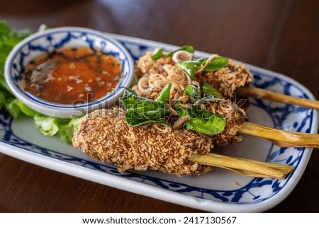 Aromatic Lao-Style Deepfried Lemongrass Chicken Wrap with Sweet and Spicy Dipping Sauce