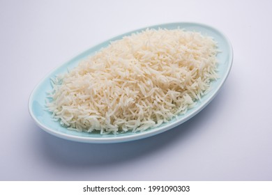 Aromatic Long Basmati cooked plain Rice is an Indian main course food, served in a bowl. selective focus