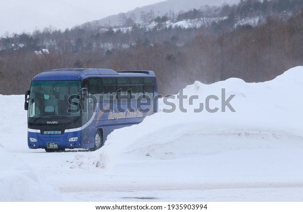 AROMORI-JAPAN-FEBRUARY 16 : The\
bus on the car park in winter season of Japan, February 16, 2019,\
Aromori\
Japan