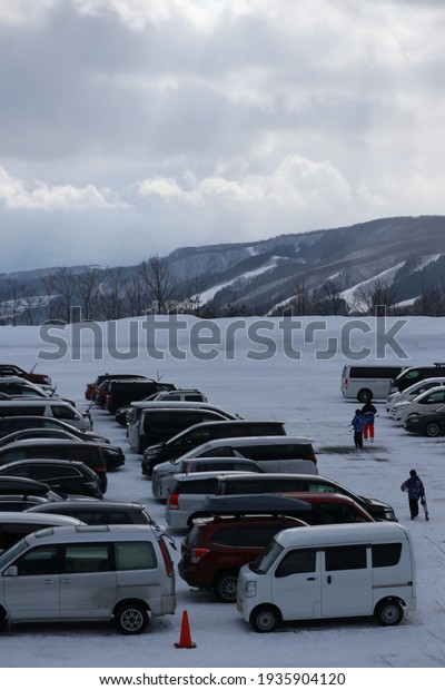 AROMORI-JAPAN-FEBRUARY 16 : View of\
the car park in winter season of Japan, February 16, 2019, Aromori\
Japan