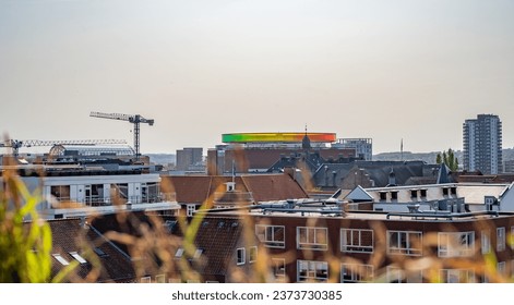 ARoS Aarhus Art Museum, view from the distance aerial view with city and buildings and plants in front in the evening, Denmark - Powered by Shutterstock