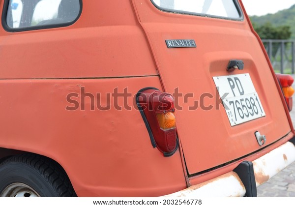 Arqua Petrarca, ITALY - SEPTEMBER 4, 2014:\
Renault 4 Quatrelle 4L classic vintage French car on the old city\
street. The first front-wheel drive family car produced by Renault\
in 1961. Rear taillight.