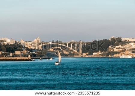 Arrabida bridge and view of the Douro river. Porto, Portugal.