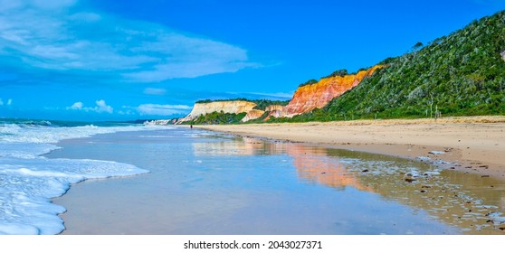 Arraial d'Ajuda is a district of the Brazilian municipality of Porto Seguro, on the coast of the state of Bahia, Cliff on Pitinga beach