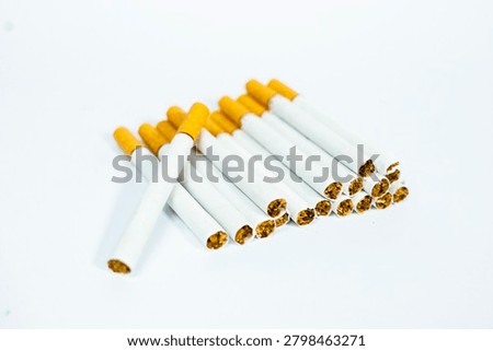Arranged stack of cigarettes with yellow filters cigarette nicotine addiction background industry lifestyle isolated