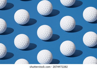 Arranged white golf ball on blue pastel background. Minimal design. - Shutterstock ID 2074972282