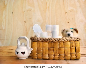 The Arrangement Of Bathroom Setting In Wooden Basket On Wooden Table And Background In Interior Decorations Concept, Selective Focus 