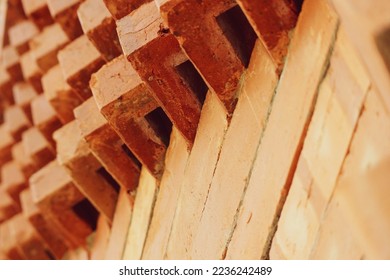 The arrangement of the bricks arranged in such a way forms a very beautiful building wall with a very interesting geometric touch. Perfect as a pattern or background. - Shutterstock ID 2236242489