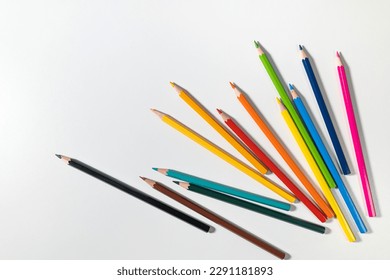 Arrangement Color pencils set in bulk on isolated white background